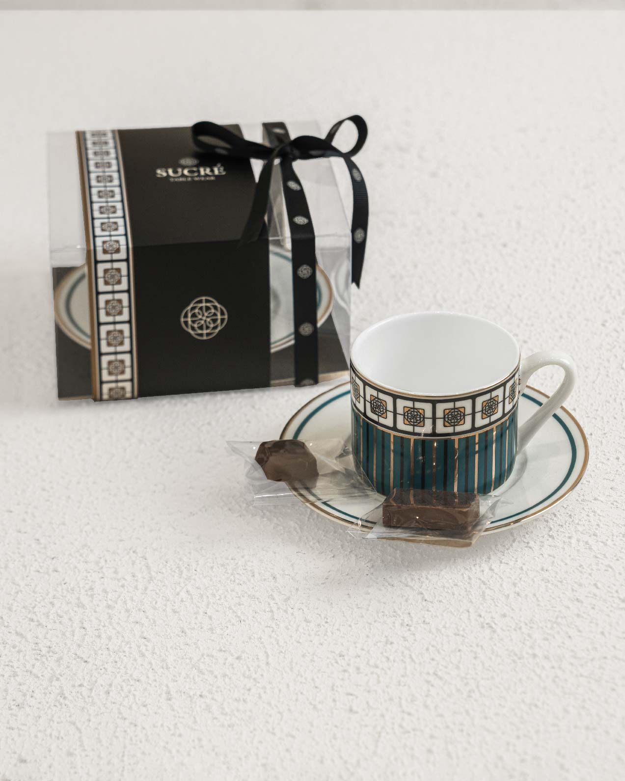 Teal Tea cup with chocolate